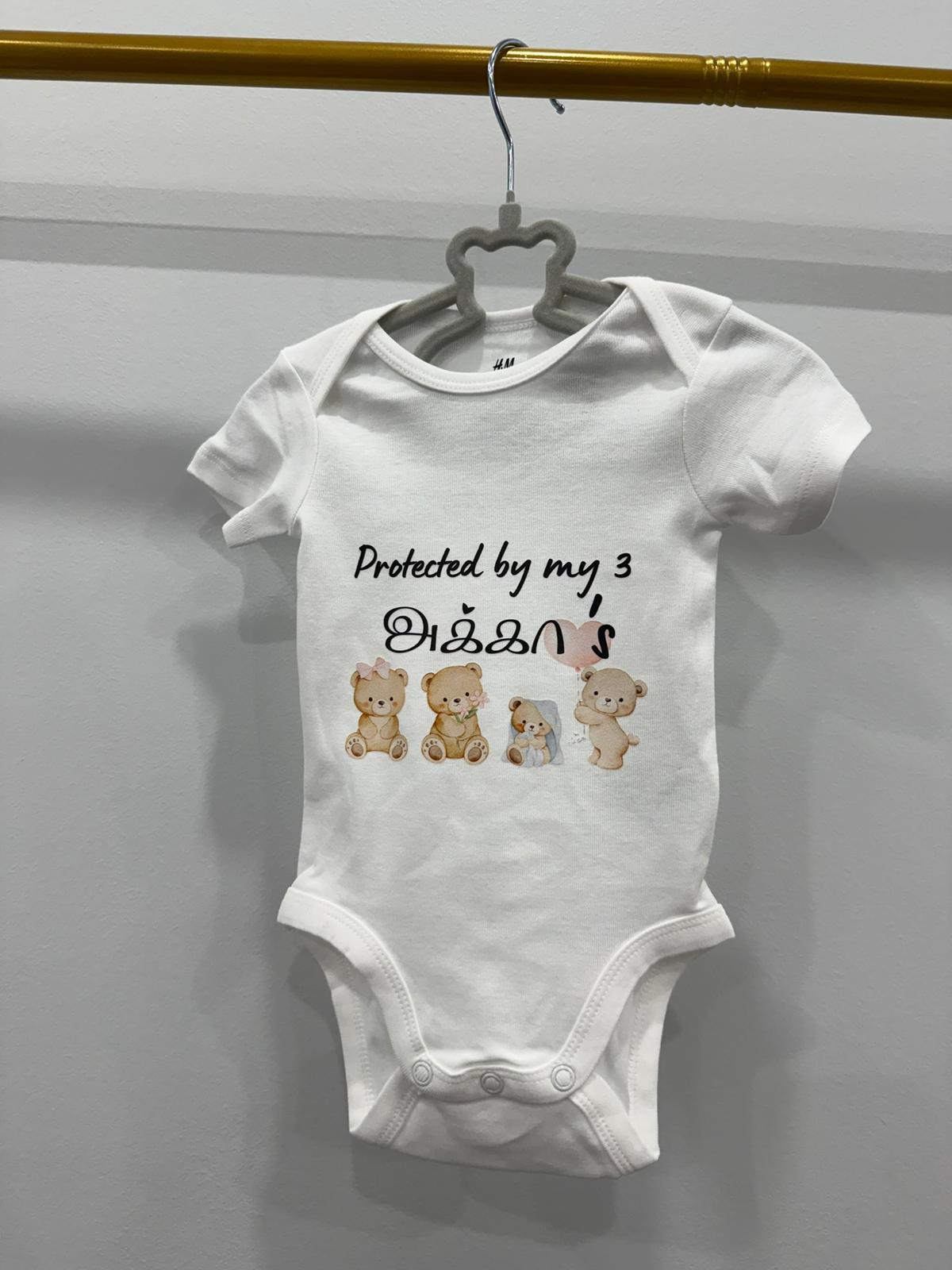 "PROTECTED BY MY AKKA'S" Onesie
